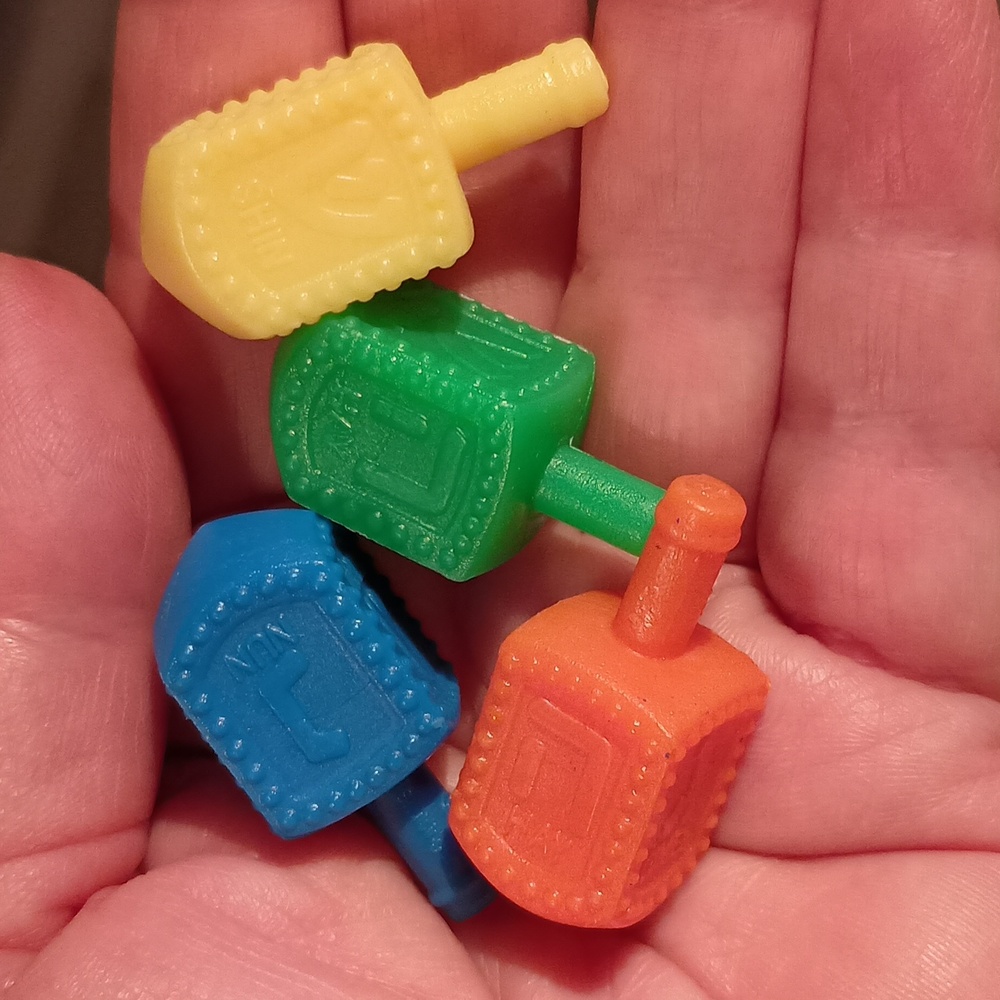 Set of 4 different color dreidels Feel letters with your fingers  Textured